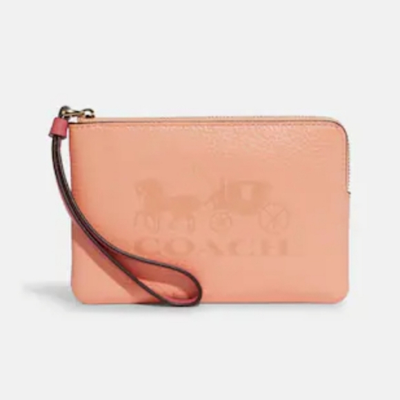 Coach Handbags - NWT Pink COACH Horse and Carriage Emblem Wristlet
